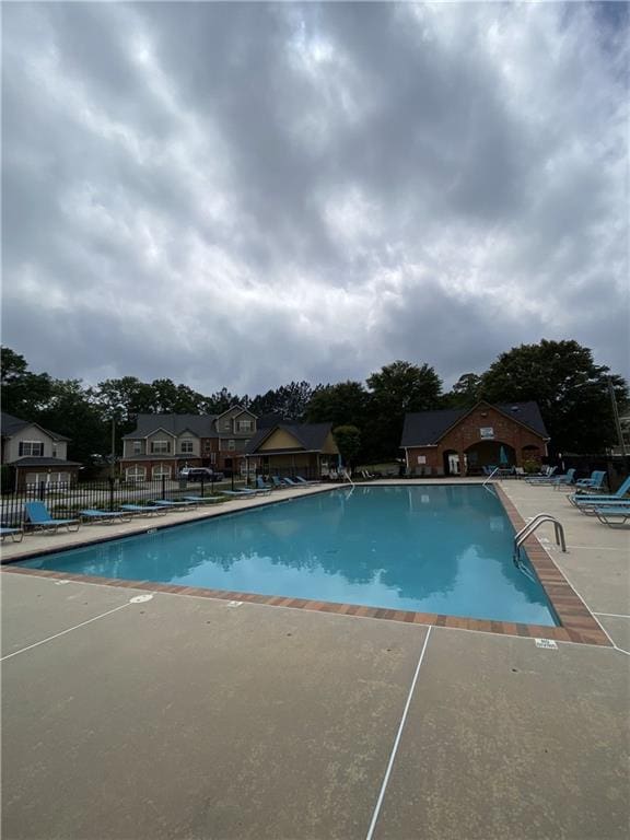 106 Trailside Way, Hiram, GA 30141 - community pool with a patio area
