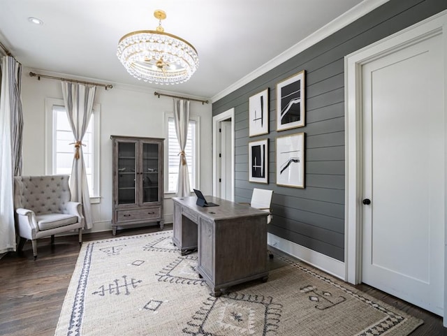 office with an inviting chandelier, dark wood-style floors, ornamental molding, and a wealth of natural light