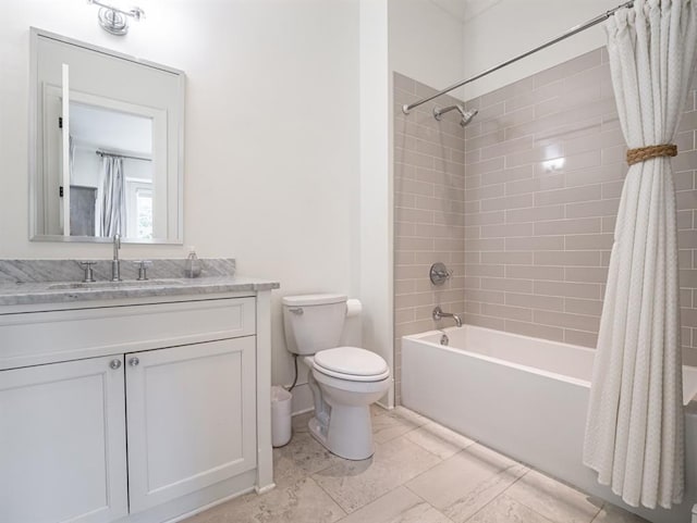 full bath with toilet, shower / bath combo, and vanity