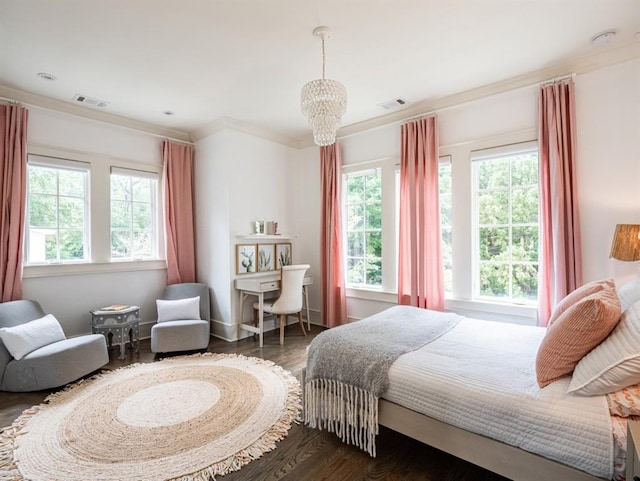 bedroom with crown molding, multiple windows, visible vents, and dark wood-type flooring