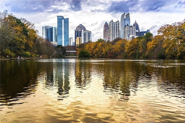 property's view of city featuring a water view