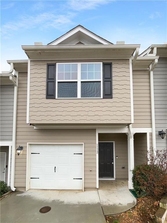 view of property with a garage