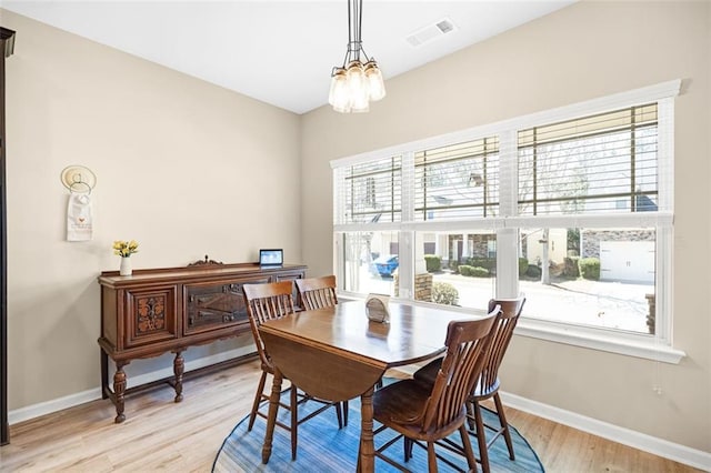 entrance foyer featuring washer / dryer, baseboards, crown molding, and wood finished floors