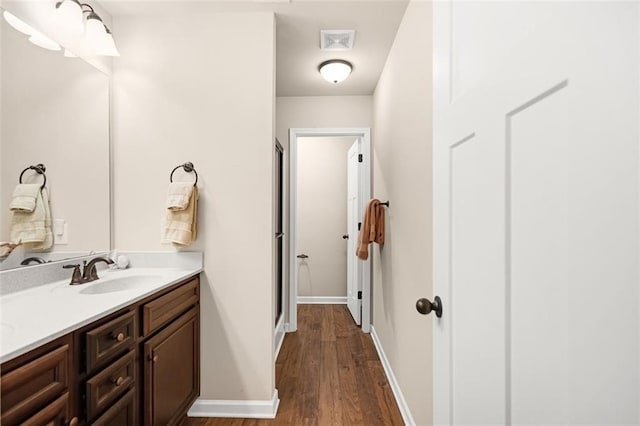 bedroom with baseboards, light carpet, and ceiling fan