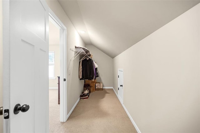 carpeted bedroom with a ceiling fan and baseboards