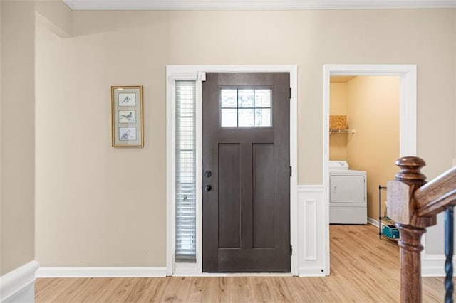 doorway to property with board and batten siding, covered porch, and stone siding