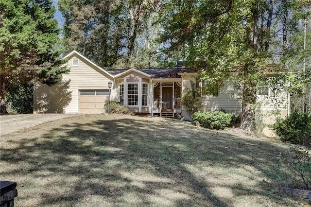 ranch-style home featuring a garage