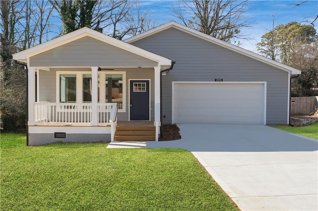 view of front of home featuring covered porch, a garage, driveway, crawl space, and a front lawn