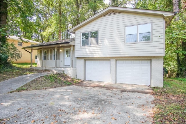 split level home featuring a garage