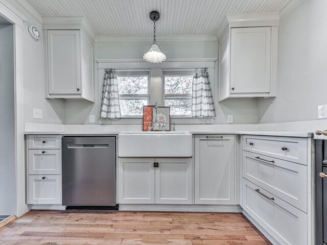 kitchen featuring light hardwood / wood-style floors, stainless steel dishwasher, and white cabinetry