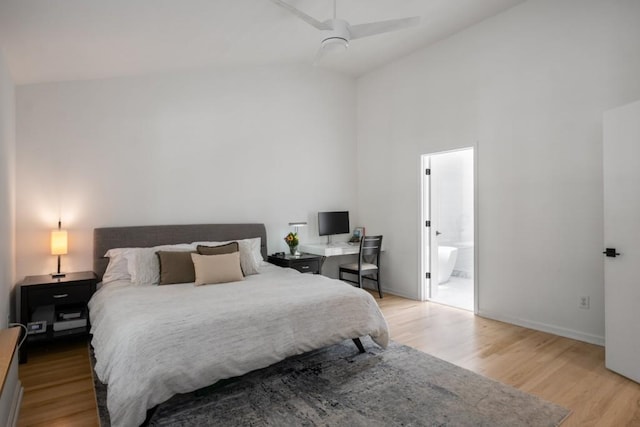 907 Edgewood Ave NE, Atlanta, GA 30307 - bedroom featuring light wood-style flooring, high vaulted ceiling, baseboards, ensuite bath, and ceiling fan