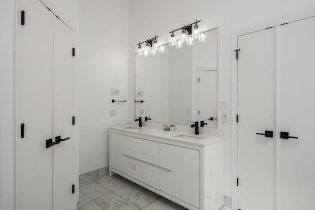 907 Edgewood Ave NE, Atlanta, GA 30307 - full bath featuring marble look tiles and double vanity