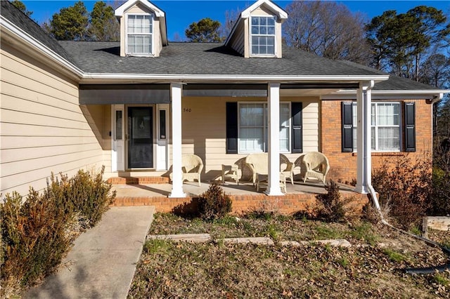 property entrance with covered porch