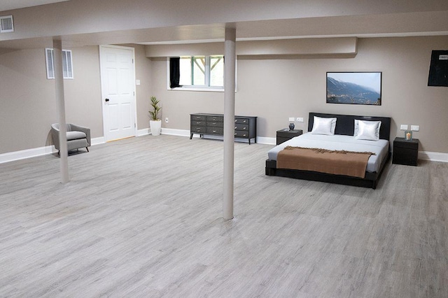 bedroom featuring light hardwood / wood-style floors