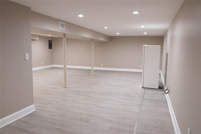 basement with light wood-type flooring