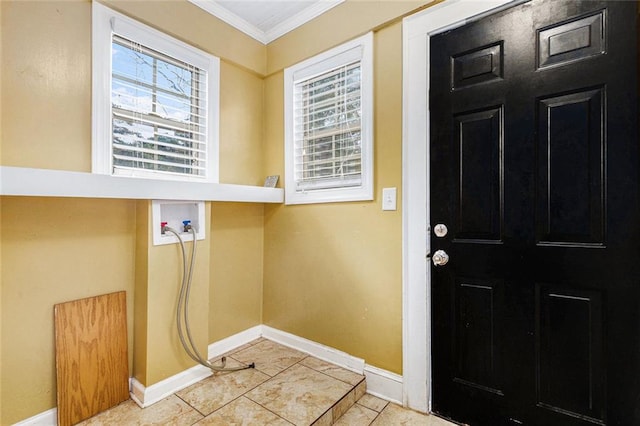 laundry room with laundry area, ornamental molding, washer hookup, and baseboards