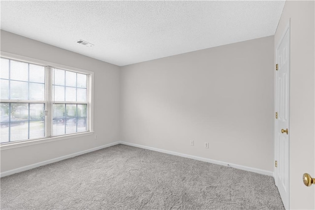 2754 Terrell Trace Dr, Marietta, GA 30067 - spare room featuring carpet flooring, a textured ceiling, and baseboards