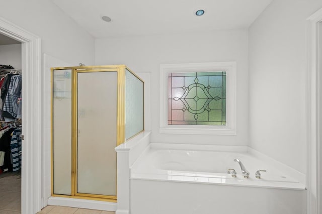 bathroom with plus walk in shower and tile patterned floors