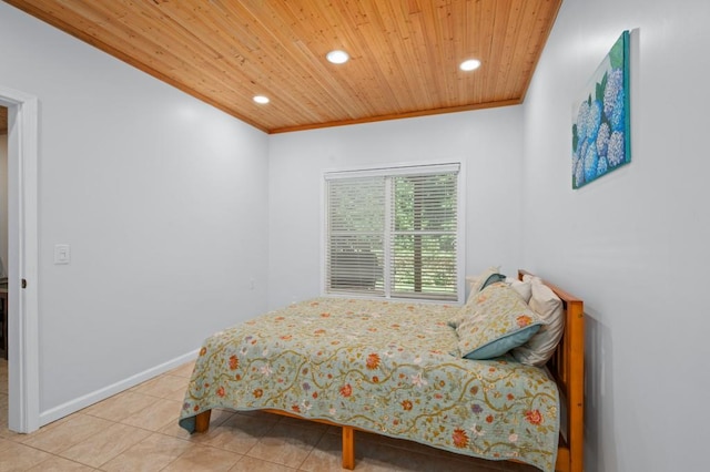 tiled bedroom with wood ceiling and ornamental molding