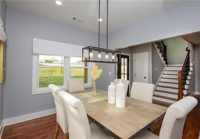 dining room featuring wood-type flooring