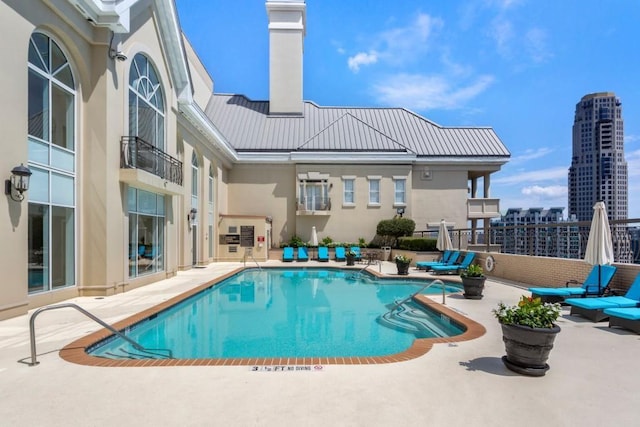 pool featuring a patio