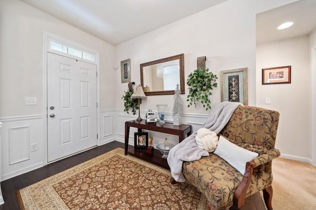 foyer with dark hardwood / wood-style flooring