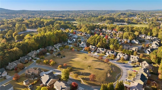 aerial view featuring a residential view and a view of trees