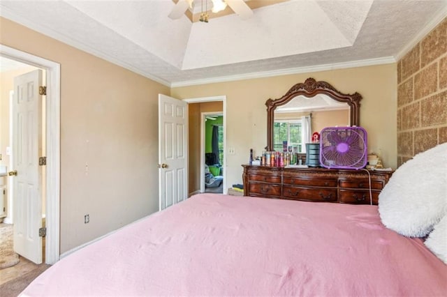 60 Boardwalk Ave, Covington, GA 30016 - bedroom with carpet, crown molding, ceiling fan, a raised ceiling, and a textured ceiling