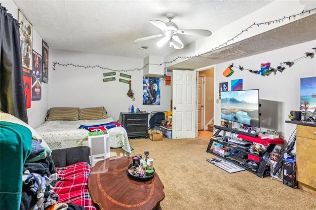 60 Boardwalk Ave, Covington, GA 30016 - bedroom featuring carpet floors, a ceiling fan, and a textured ceiling
