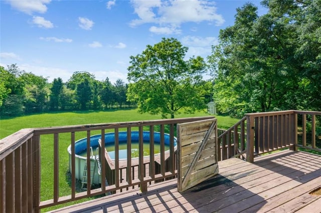 60 Boardwalk Ave, Covington, GA 30016 - wooden deck with a lawn