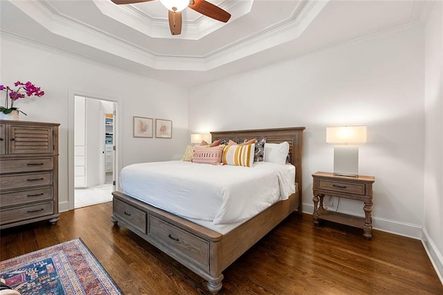3714 Westbrooke Cir NE, Brookhaven, GA 30319 - bedroom featuring crown molding, a tray ceiling, wood finished floors, a ceiling fan, and baseboards