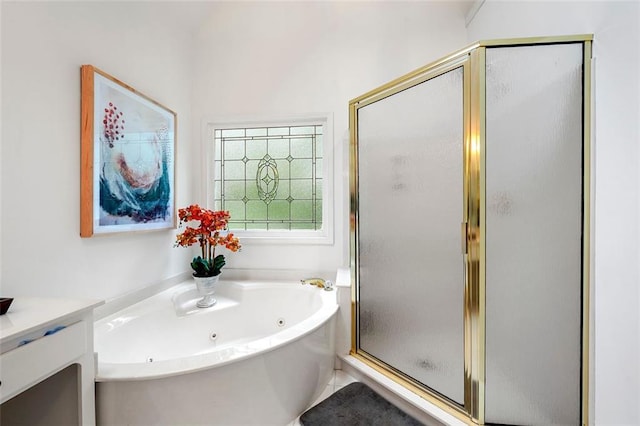 3714 Westbrooke Cir NE, Brookhaven, GA 30319 - bathroom featuring a shower stall, a jetted tub, and vanity