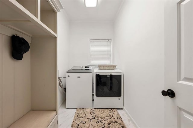 3714 Westbrooke Cir NE, Brookhaven, GA 30319 - washroom featuring washing machine and clothes dryer and ornamental molding
