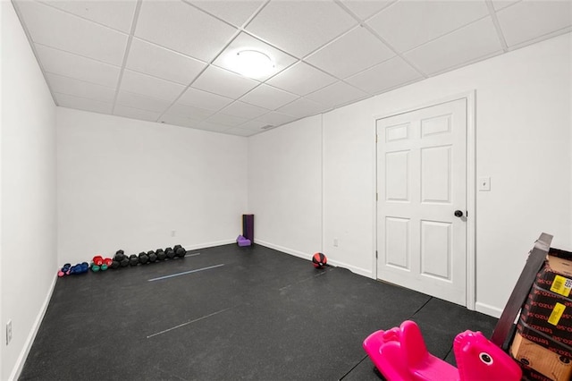 3714 Westbrooke Cir NE, Brookhaven, GA 30319 - rec room featuring rubber floors, baseboards, and a drop ceiling