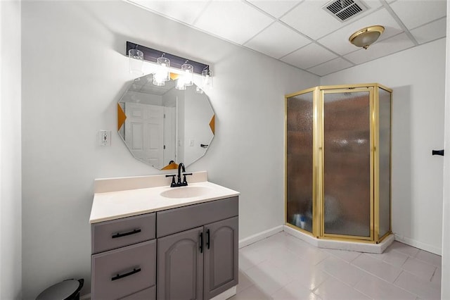 3714 Westbrooke Cir NE, Brookhaven, GA 30319 - full bathroom featuring vanity, a stall shower, tile patterned floors, a paneled ceiling, and baseboards