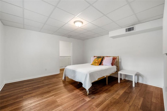 3714 Westbrooke Cir NE, Brookhaven, GA 30319 - bedroom with a drop ceiling, wood finished floors, and baseboards