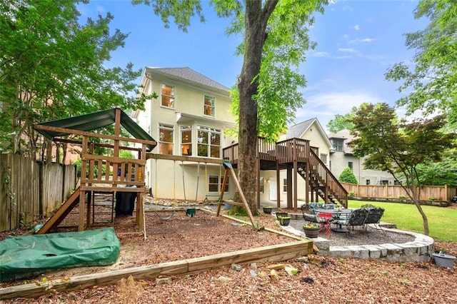 3714 Westbrooke Cir NE, Brookhaven, GA 30319 - view of play area with stairs and a wooden deck