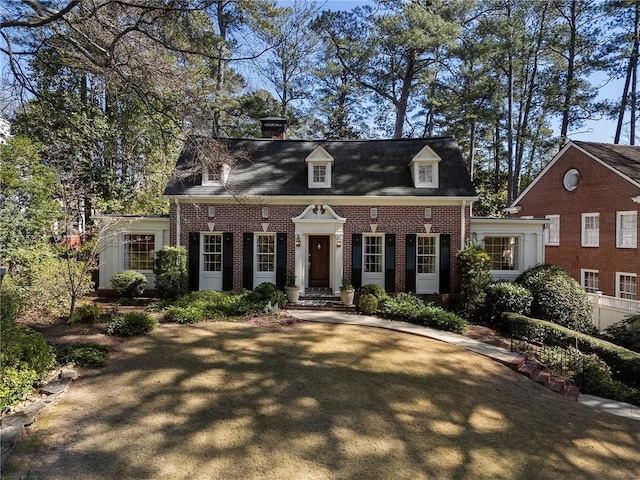 view of front of home with brick siding