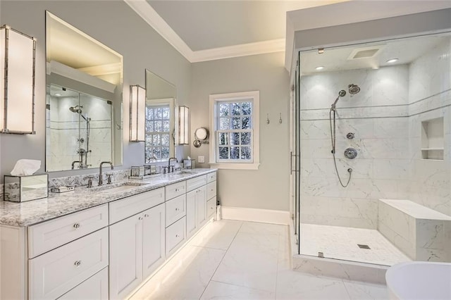 bathroom with vanity, an enclosed shower, and crown molding