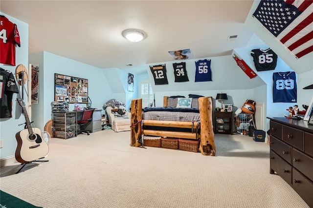 carpeted bedroom featuring lofted ceiling