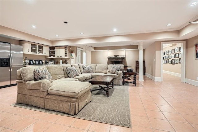 tiled living room with crown molding