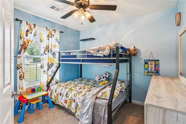 1671 Bismarck Cir, Winder, GA 30680 - carpeted bedroom with ceiling fan and a textured ceiling