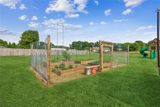 1671 Bismarck Cir, Winder, GA 30680 - view of jungle gym with a vegetable garden