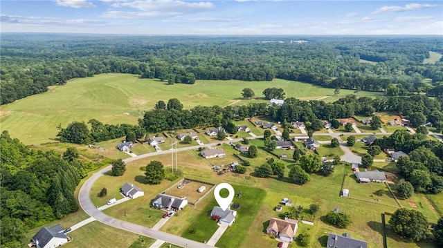 1671 Bismarck Cir, Winder, GA 30680 - aerial view of property and surrounding area featuring a heavily wooded area