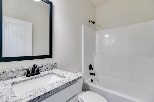 full bath with vanity, toilet, and bathtub / shower combination