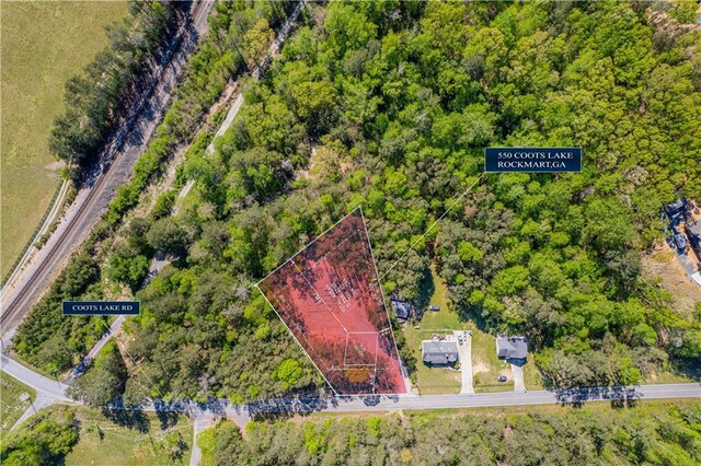 aerial view of property's location featuring property parcel outlined