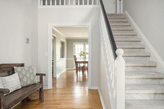 2689 Spring Rock Ct NE, Roswell, GA 30075 - stairs featuring wood finished floors and ornamental molding