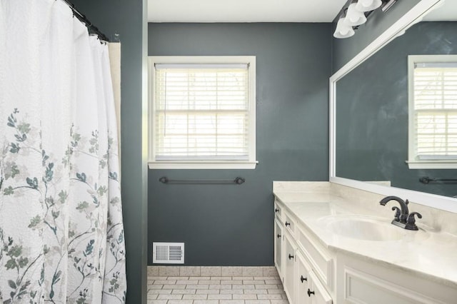 2689 Spring Rock Ct NE, Roswell, GA 30075 - full bathroom featuring vanity and baseboards