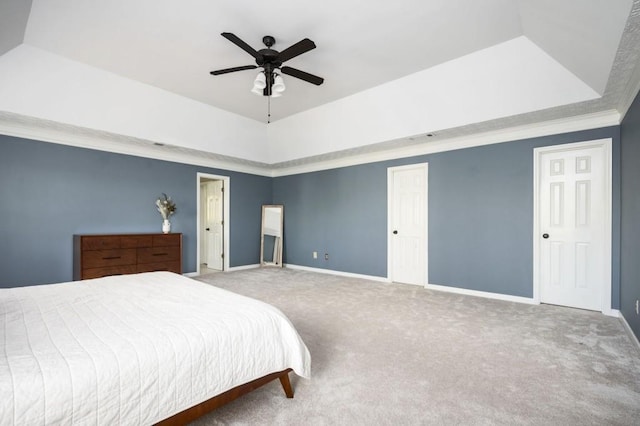 2689 Spring Rock Ct NE, Roswell, GA 30075 - carpeted bedroom featuring a raised ceiling and a ceiling fan