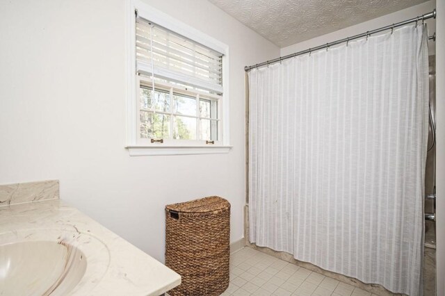 2689 Spring Rock Ct NE, Roswell, GA 30075 - full bath with vanity, tile patterned flooring, and a shower with curtain